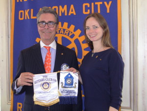 President Tim Strange exchanges Rotary banners with Tove Ragna Reksten, from the Bergenhus Rotary Klubb D 2250 - Norway